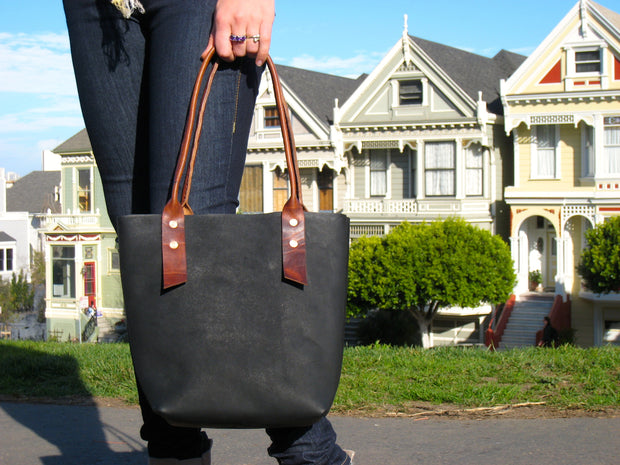 rolled handle wedge tote-